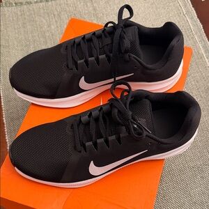 Nike Black Athletic Running Shoes with White Swoosh